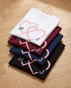 T-shirt couple personnalisé — cœurs & prénoms